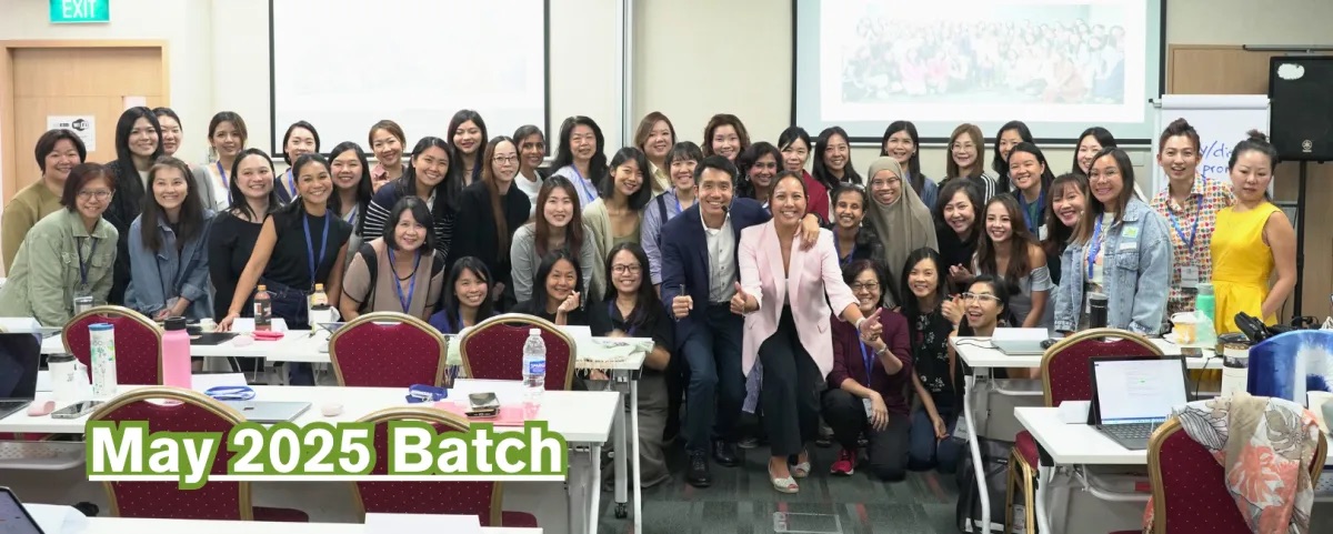 The May 2025 Digital X Bootcamp intake, around 50 participants with Calvin and Patricia at the front of the training room